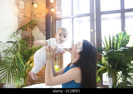 Portrait of mother with her adorable baby boy Stock Photo