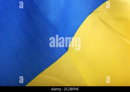 The Flag Of Ukraine Is A Banner Of Two Equally Sized Horizontal Bands Of Blue And Yellow. Stock Photo