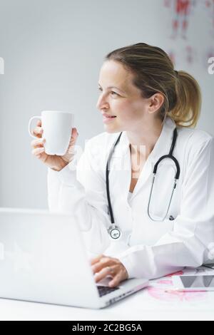portrait of beautyful young and happy female doctor Stock Photo