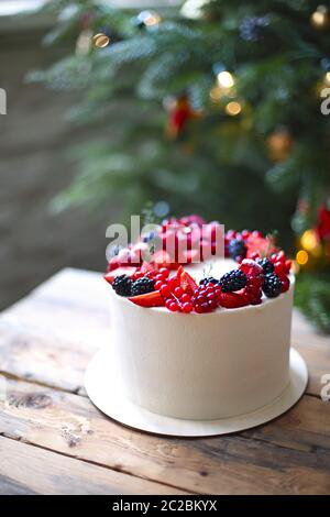 Christmas Cake by the Christmas tree Stock Photo