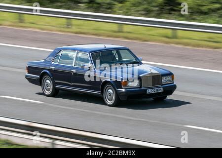1997 Rolls Royce Silver Spur Auto driving on the M6 motorway near Preston in Lancashire, UK Stock Photo
