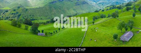 Aerial view with a drone of the spring landscape of pasiegas cabins and meadows in Miera Valley in Autonomous Community of Cantabria. Spain, Europe Stock Photo