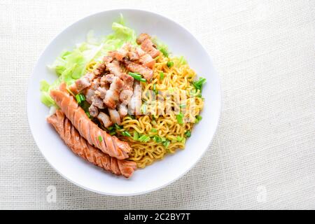 Udon noodles with grilled pork, sausage and cabbage - Japanese cuisine Stock Photo