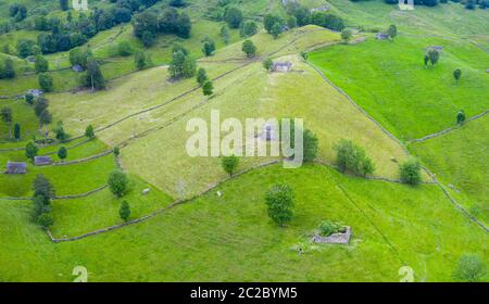 Aerial view with a drone of the spring landscape of pasiegas cabins and meadows in Miera Valley in Autonomous Community of Cantabria. Spain, Europe Stock Photo