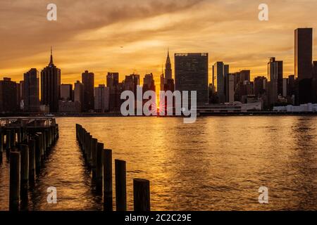 Sunset Manhattanhenge at Midtown Manhattan Skyline, New York United States Stock Photo