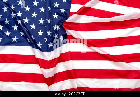 Natural fabric crumpled USA flag, rag American flag top view as texture or background, high resolution picture Stock Photo