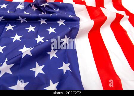 Natural fabric crumpled USA flag, rag American flag top view as texture or background, high resolution picture Stock Photo