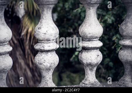 Balusters made of stone on the old historic staircase Stock Photo