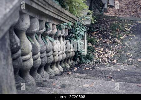 Balusters made of stone on the old historic staircase Stock Photo