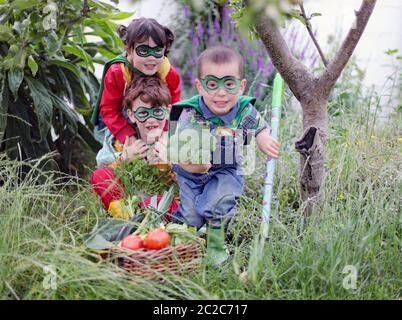 Frank Kenny, 7, Nora Kenny, 5, and Tom Kenny (right), 3, at the launch of the national BiaHero campaign in Dublin, which seeks to tackle the problems of food security in a time of climate change and biodiversity loss by supporting people in growing their own healthy, local food. Stock Photo