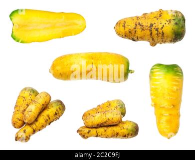 set of several organic uzbek yellow carrots isolated on white background Stock Photo