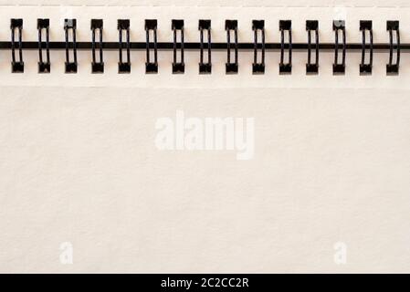 Empty blank sheet, page of spiral bound notepad, light horizontal background, copy space Stock Photo