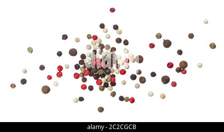 Heap of black, red, white and allspice peppercorns isolated on white background, top view Stock Photo