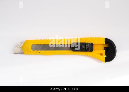 stationery knife on white background Stock Photo