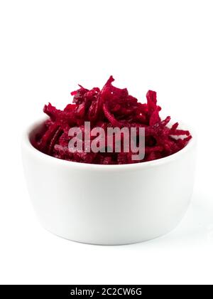 Grated beetroot in ceramic bowl isolated on white Stock Photo