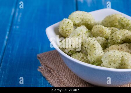 White mulberry on rustic board Stock Photo