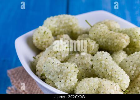 White mulberry on rustic board Stock Photo