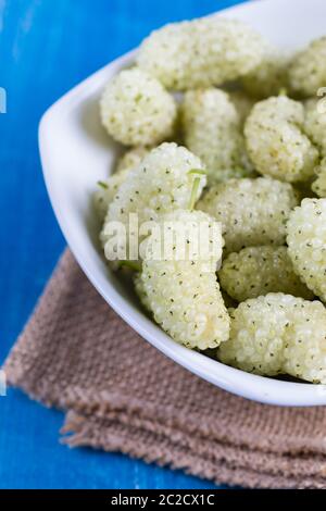 White mulberry on rustic board Stock Photo