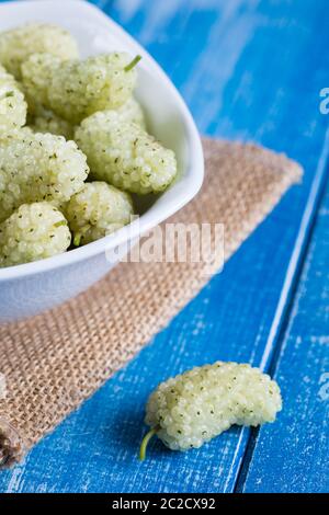 White mulberry on rustic board Stock Photo