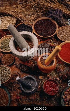 Different kind of spices in mortar, spice concept Stock Photo