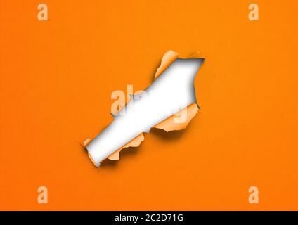 Orange torn paper with hole. blank background template Stock Photo