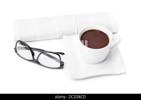 Cup of coffee with a rolled up newspaper and glasses, isolated on white background. My morning routine. Stock Photo