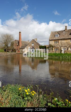The Old Mill Museum and cotswold cottages by the River Eye, Lower Slaughter, Cotswolds, Gloucestershire, England, United Kingdom, Europe Stock Photo