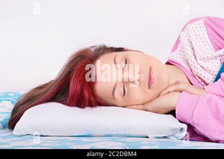 Sleep tight. Close up shot of a beautiful young girl sleeping in her bed. Stock Photo