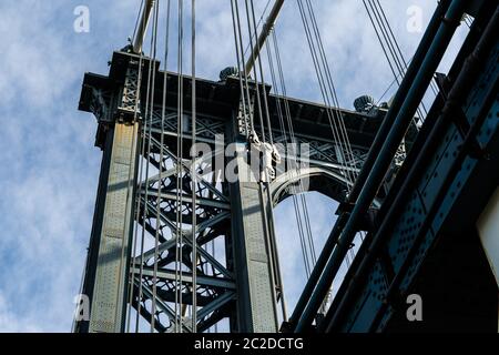 Brooklyn, NY / USA - JUL 31 2018: Looking up at details of Manhattan Bridge Stock Photo