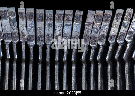 Antique Typewriter letters closeup photo - Vintage old Typewriter Machine detail Stock Photo