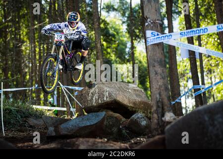PIETERMARITZBURG, SOUTH AFRICA - APRIL 22, 2011. Damien Spagnolo racing for Team Subaru Mondraker at the UCI Downhill Mountain Bike World Cup Stock Photo