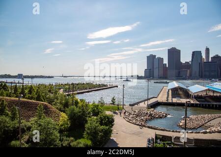 New York, City / USA - JUL 10 2018: Fort Stirling Park in clear afternoon of Lower Manhattan Skyline view from Brooklyn New York Stock Photo