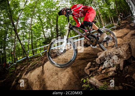 MONT ST ANNE, CANADA - JULY 3, 2011. Josh Bryceland (GBR) racing for Team Santa Cruz at the UCI Downhill Mountain Bike World Cup Stock Photo