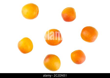 Isolated group of apricots on white background with clipping path Stock Photo