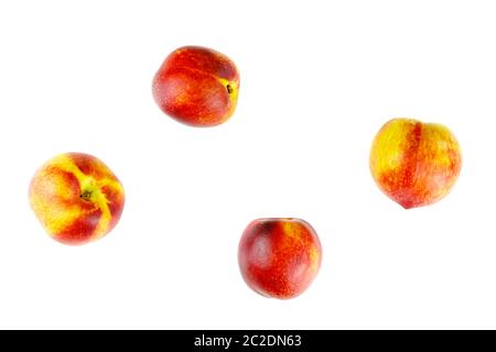 Ripe juicy nectarines isolated on white background Stock Photo