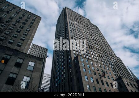 Underside panoramic and perspective view to facade fragment of Rockefeller Center building in midtown Manhattan Stock Photo