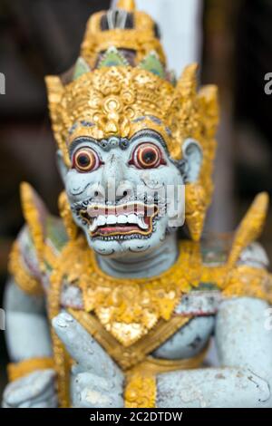 Indonesia Bali Sept 20 2019, Closeup of Balinese God statue in temple complex, hindu god statue colorful Stock Photo