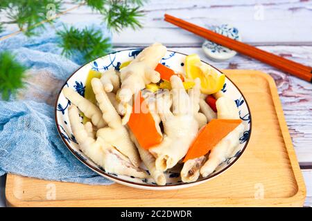 Delicious snacks pickled chilli chicken feet Stock Photo