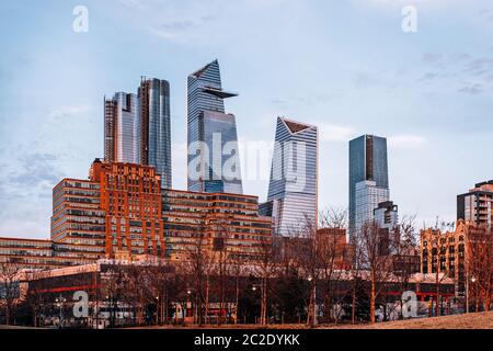 Sunset view of Hudson Yards skyline from Pier 64 in Chelsea New York City Stock Photo