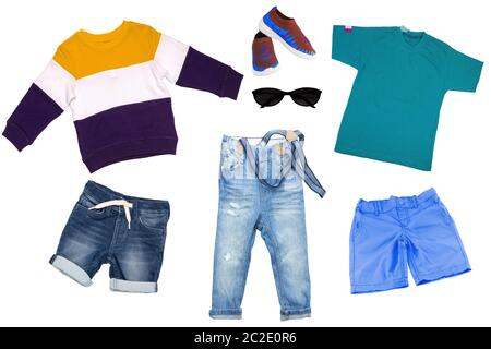 Collage set of children clothes. Denim jeans or pants, two pair shoes, a  jeans shirt, striped shirt and a sweater for child boy isolated on a white  ba Stock Photo - Alamy
