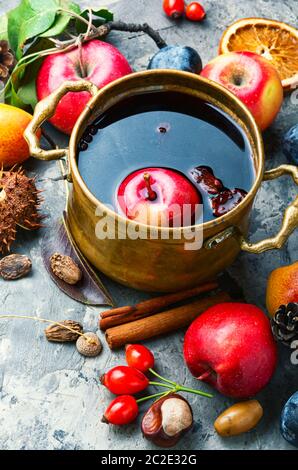 Mulled wine in a stylish bowl.Warm autumn alcoholic drink Stock Photo