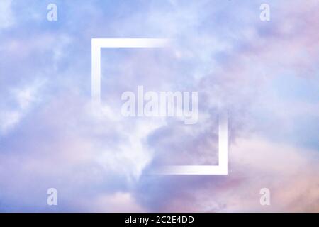 Pastel toned purple sky background with clouds and a frame, an abstract design template with a place for text Stock Photo