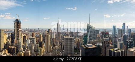Midtown and downtown skyscrapers of New York cityscape view from rooftop Rockefeller Center Stock Photo