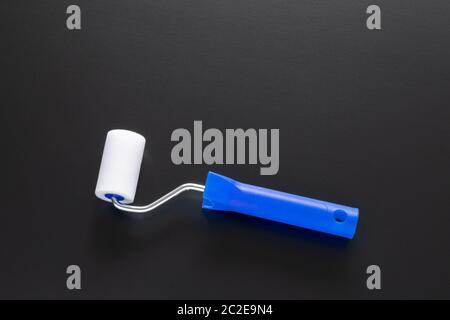 painting roller isolated on black background Stock Photo