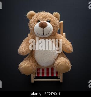 teddy bear isolated on black background Stock Photo