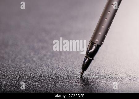 automatic plastic ballpoint pen with clipping path on black background. close up. Stock Photo
