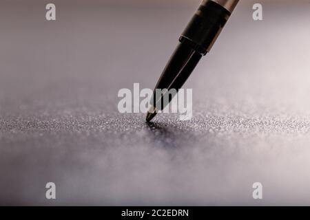 automatic plastic ballpoint pen with clipping path on black background. close up. Stock Photo