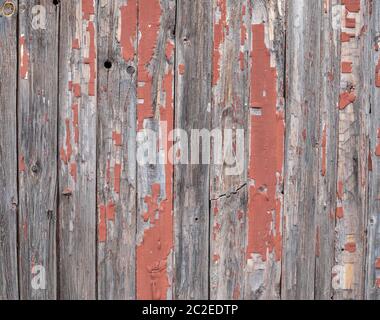 Peeling off an old wooden wall Stock Photo