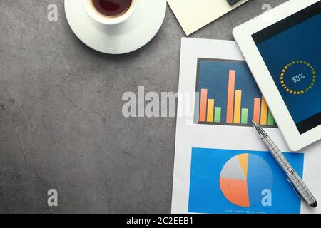financial graph and digital tablet on table, using self created chart  Stock Photo
