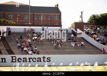The Sherman High School Class of 2020 commencement ceremony is held on June 13 at Bearcat Stadium in Sherman, TX. Stock Photo